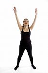 Standing Girl Stretching Her Arms Stock Photo