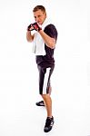 Standing Man with punch pose Stock Photo