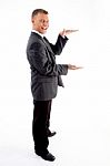 Standing Measuring Businessman Stock Photo