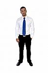 Standing Young Businessman Stock Photo