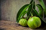 Still Life With Fresh Garcinia Cambogia On Wooden Background (th Stock Photo