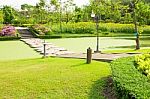 Stone Walkway Across Water In The Park Stock Photo