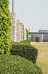 Stone Wall In The Garden For Background Stock Photo