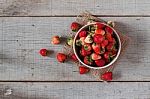 Strawberry On A Wooden Stock Photo