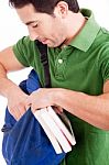 Student Looking Through Bag Stock Photo