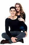 Studio Shot Of Romantic Young Couple Stock Photo