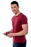 Stylish Guy Using Mobile Phone Stock Photo