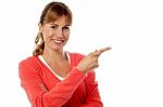 Stylish Woman Pointing At Something Stock Photo