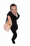 Successful Businessman Showing Thumbsup Stock Photo