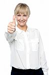 Successful Businesswoman Showing Thumbs Up Stock Photo