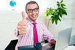 Successful Entrepreneur Showing Thumbs Up Stock Photo