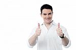 Successful Man Showing Thumbs Up Gesture Stock Photo