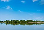 Summer Forest River With Reflection Of The Sky Stock Photo