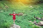 Summer Portrait Of Young  Women Enjoying Nature  In Tight Fitting Red Dress Summer Vacation,sunny,having Fun, Positive Mood,romantic, Against Background Of Summer Green Park, Green Leaves Stay Outdoor Stock Photo