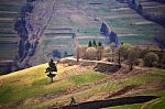 Sunny Spring In Mountain Village. Fields And Hills Stock Photo