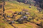 Sunny Spring In Mountain Village. Fields And Hills Stock Photo