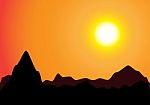 Sunset And Mountains In Silhouette Stock Photo