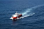 Supply Boat Transfer Cargo To Oil And Gas Industry Stock Photo