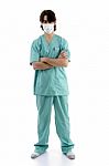 Surgeon In Scrubs With Facemask Stock Photo