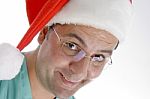 surgeon Wearing Christmas Hat Stock Photo