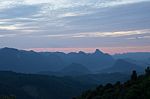 Sweet Sky With Big Mountains Background Stock Photo