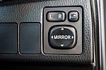 Switch Button Adjust Or Controls Side Mirrors In A Car Stock Photo