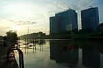 Tall Buildings, Rivers, And Sun. A Captivating Composition For A Moment In The Morning Stock Photo