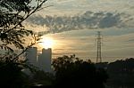 Tall Buildings, Rivers, And Sun. A Captivating Composition For A Moment In The Morning Stock Photo