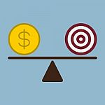 Target And Money Coin On Scale Stock Photo