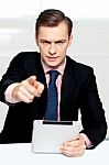 Tech Savvy Corporate Man Pointing At You Stock Photo