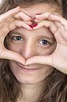 Teen With Hands In Heart Shape Stock Photo