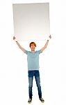 Teenage Boy Showing Blank Board Stock Photo