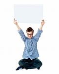 teenage Boy Showing Empty board Stock Photo