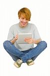 Teenage Boy Using Ipad Stock Photo