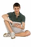 Teenage Boy Using Ipad Stock Photo