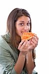 Teenage Girl Eating Pizza Stock Photo