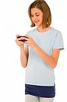 Teenage Girl Reading Sms Stock Photo