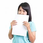 Teenage Girl Showing Blank Paper Stock Photo