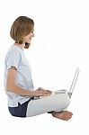 Teenage Girl Using Laptop Stock Photo