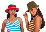 Teenage Girls Posing In Hats Stock Photo