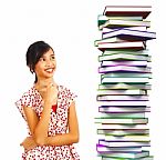 Teenage Student With Stacked Books Stock Photo