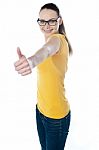 Teenager Gesturing Thumbs-up Stock Photo