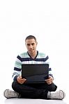 Teenager Guy Working On Laptop Stock Photo