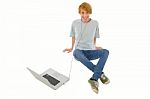 Teenager Listening Music With PC Stock Photo