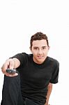 Teenager With TV Remote Control Stock Photo