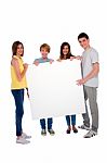 Teenagers Holding Blank Board Stock Photo