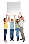 Teenagers Holding Blank Board Stock Photo