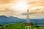 Telecommunication Tower During Sunset Mountain Background In Rai Stock Photo