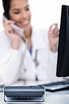 Telephone Of Focus, Doctor Talking With It Stock Photo