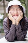 Thai Adult Girl White Cap Gray T-shirt Beautiful Girl Relax And Smile Stock Photo